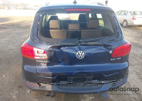 2014 Volkswagen Tiguan Sel z USA, uszkodzony, nr VIN WVGAV3AX7EW626003